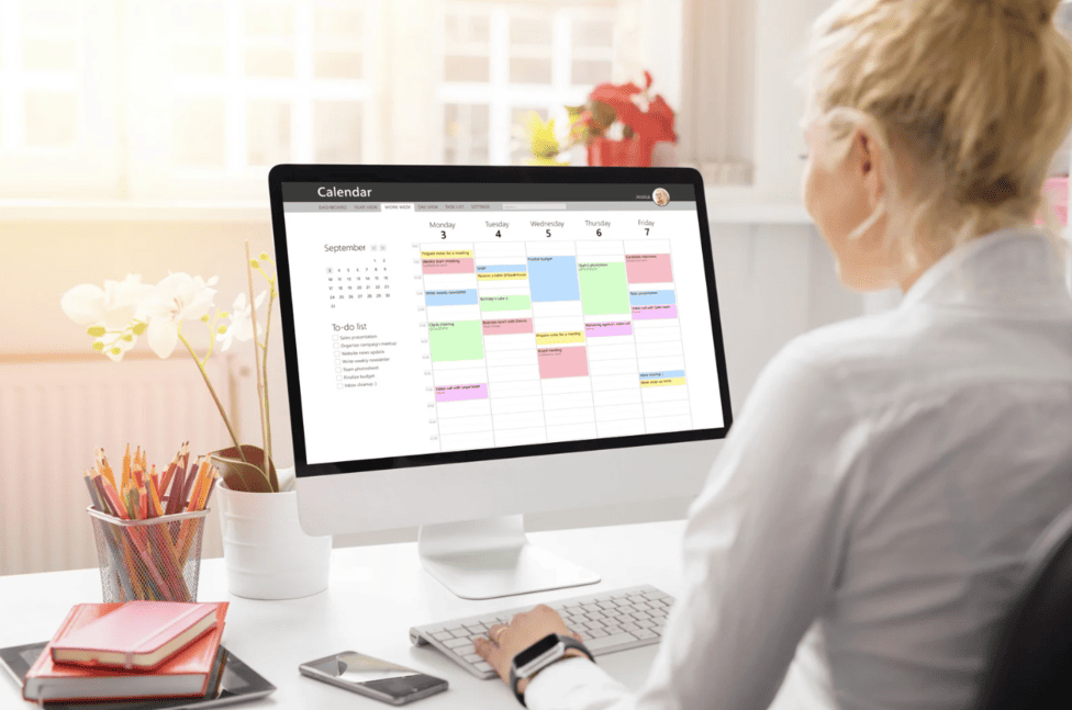 Home office with clear visual boundaries and communication systems for remote working parents